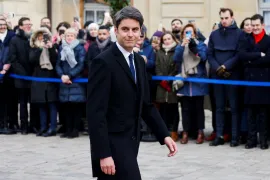 Gabriel Attal, 34, served as France's education minister before being named new prime minister on Tuesday [Ludovic Marin/AFP]