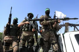 Palestinian fighters on truck