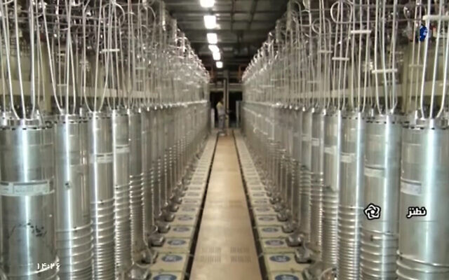 Various centrifuge machines line a hall at the Natanz Uranium Enrichment Facility, on April 17, 2021. (Screenshot/Islamic Republic Iran Broadcasting-IRIB, via AP)