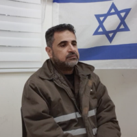 Director of Gaza's Kamal Adwan hospital Ahmed Kahlot is seen being interrogated by the Shin Bet in a video published on Tuesday, December 19, 2023. (Shin Bet)