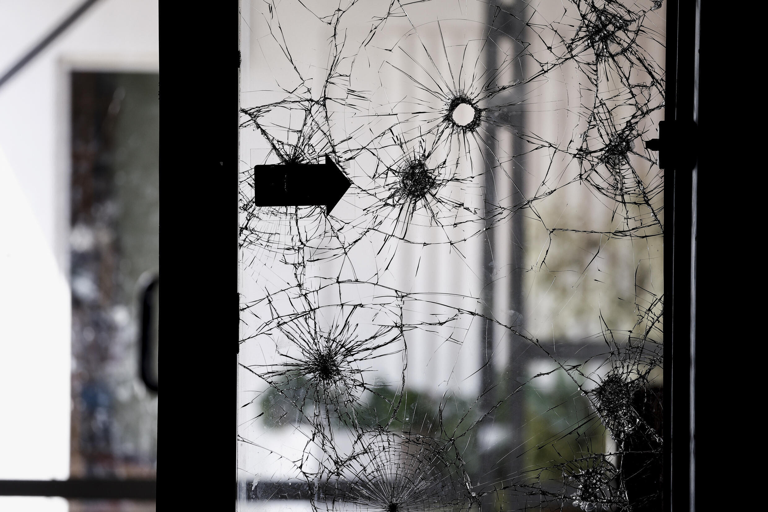 A bullet-riddled window at Kibbutz Nir Oz