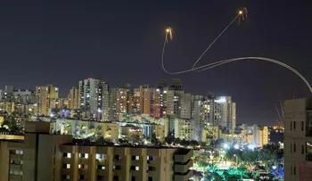 Israel's Iron Dome anti-missile system intercepts rockets launched from the Gaza Strip, amid the ongoing conflict between Israel and the Palestinian Islamist group Hamas, as seen from Ashkelon, Israel, December 25, 2023. REUTERS/Amir Cohen