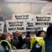 People display signs, chant, and sing as they await arrest during a protest in the US Capitol rotunda to call for a permanent ceasefire in Gaza and oppose a military aid package for Israel, in Washington, US December 19, 2023.