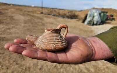 A Byzantine-era oil lamp found by reserve soldiers near Gaza, in a photo released on December 26, 2023. (Sarah Tal/IAA)