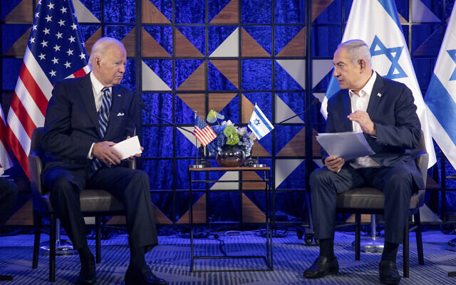US President Joe Biden, left, meets with Israeli Prime Minister Benjamin Netanyahu, right, to discuss the the war between Israel and Hamas, in Tel Aviv, Israel, on October 18, 2023 (Miriam Alster/Pool Photo via AP)