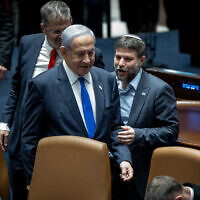 Prime Minister Benjamin Netanyahu (left) and Finance Minister Bezalel Smotrich attend a vote on the 'reasonableness' bill at the Knesset, in Jerusalem, on July 24, 2023. (Yonatan Sindel/Flash90)