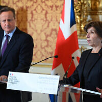 French Foreign Minister Catherine Colonna (R) and British Foreign Minister David Cameron give a press conference in Paris on December 19, 2023. (Miguel MEDINA / AFP)