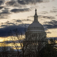 The Capitol is seen under a winter sky in Washington, December 18, 2023. (AP Photo/J. Scott Applewhite)