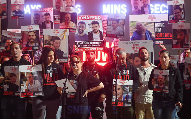 Families of Israelis held hostage by Hamas terrorists in Gaza hold a press conference at "Hostages Square," outside the Tel Aviv Museum of Art, December 16, 2023. (Avshalom Sassoni/Flash90)