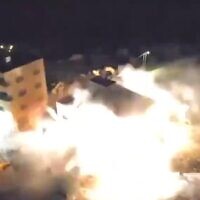 The IDF demolishes the home of Osama Bani Fadl, who had been arrested for gunning down two Israelis, in the West Bank town of Aqraba, December 19, 2023. (IDF screenshot)