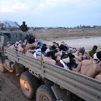 Palestinian men after their surrender to troops in northern Gaza's Jabaliya, on December 10, 2023. (Social media; used in accordance with Clause 27a of the Copyright Law)