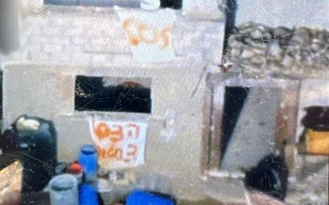 This photo released by the Israel Defense Forces on December 17, 2023, shows signs reading 'SOS' and 'Help, 3 hostages,' that were put up in Gaza by three Israeli hostages who were later mistakenly killed by IDF troops. (Israel Defense Forces)