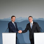 Israeli President Isaac Herzog in Bern, Switzerland, shaking hands with Inazio Cassis following the signing of a memorandum of understanding between the Israeli National Science Foundation and the Swiss National Science Foundation in a joint research venture, August 29, 2022. (Photos: Haim Zach/GPO/Wikimedia Commons)