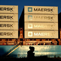 Containers of Danish shipping and logistics company Maersk are seen in Copenhagen, Denmark, on September 14, 2023. (Sergei Gapon/AFP)