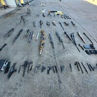 Weapons seized by IDF troops in the West Bank's Nur Shams refugee camp, December 26, 2023. (Israel Defense Forces)