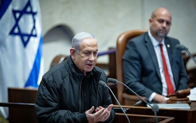 Prime Minister Benjamin Netanyahu speaks before the Knesset on December 25, 2023. (Yonatan Sindel/Flash90)
