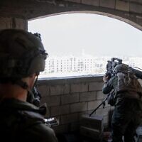 IDF forces operate in the Gaza Strip, in a handout photo released on December 26, 2023. (Israel Defense Forces)