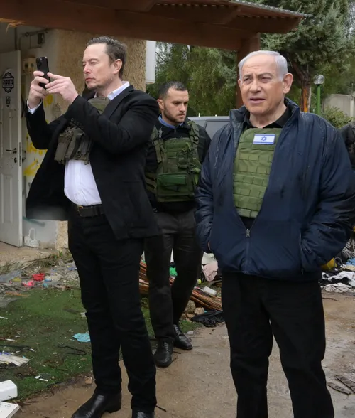 Elon Musk visits kibbutz Kfar Azza, the scene of a Hamas massacre on October 7, with Israeli Prime Minister Benjamin Netanyahu on November 27, 2023.